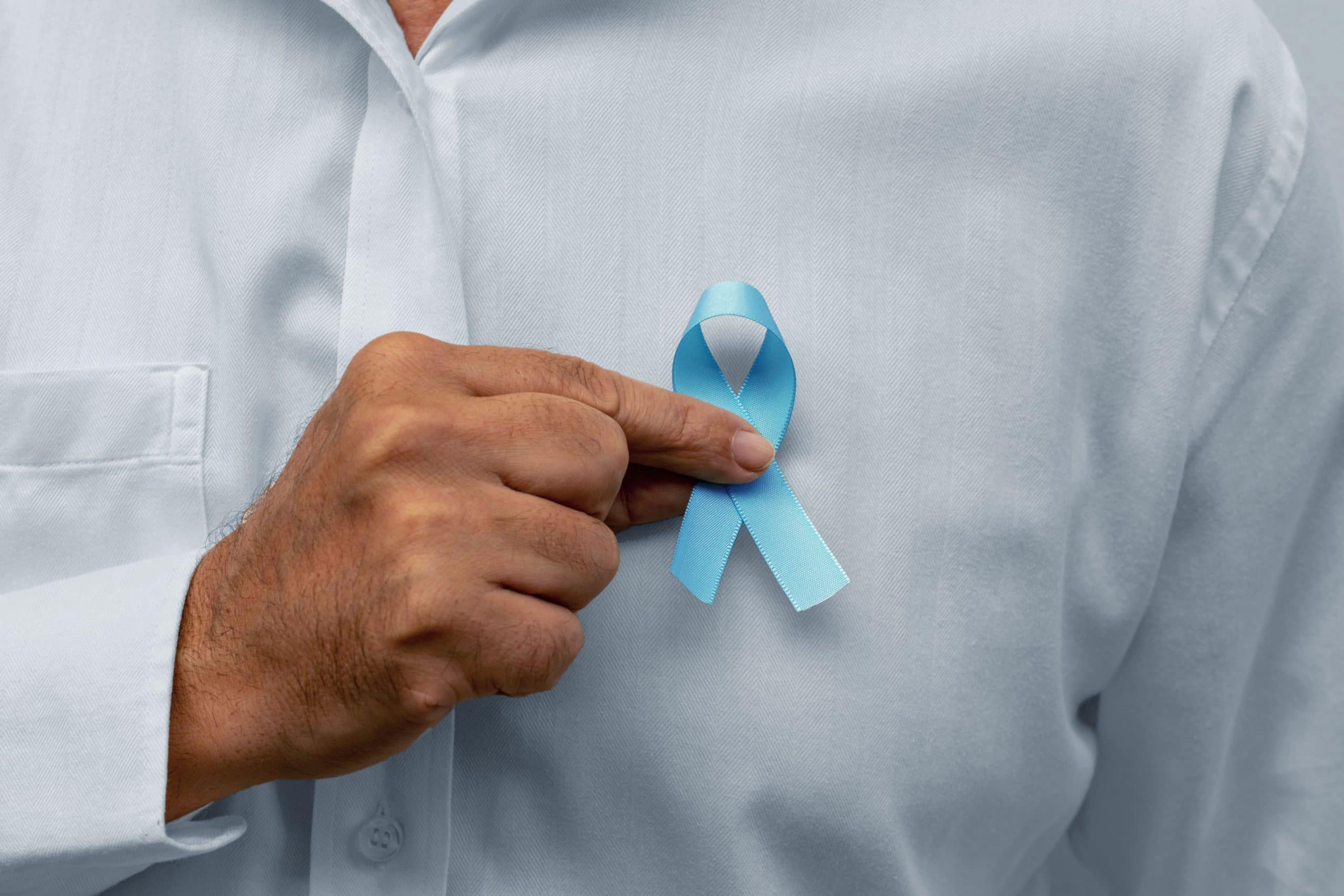 blue-november-man-holding-blue-ribbon-1-TINNY - Poliklinika Medikol